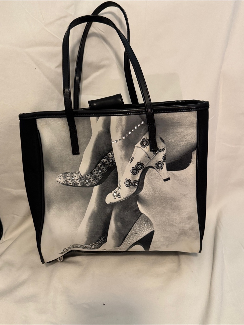 Black and White Graphic Tote Bag with Decorative Shoe Print